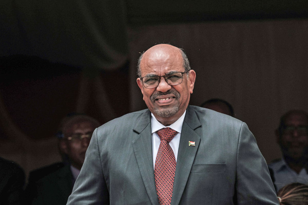 In this file photo taken on July 05, 2018 Sudan's President Omar Al Bashir walks to make his speech during the inauguration ceremony of Djibouti International Free Trade Zone  in Djibouti (AFP photo)