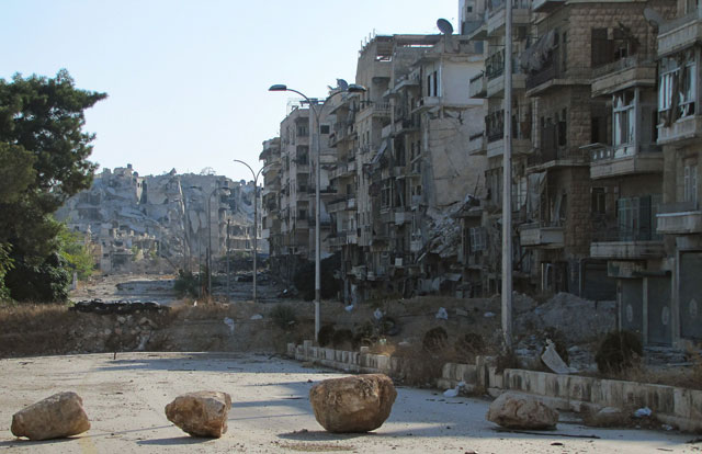 A picture shows destruction as Syrian pro-government forces advance in Aleppo’s Bustan Al Basha neighbourhood on Thursday (AFP photo)