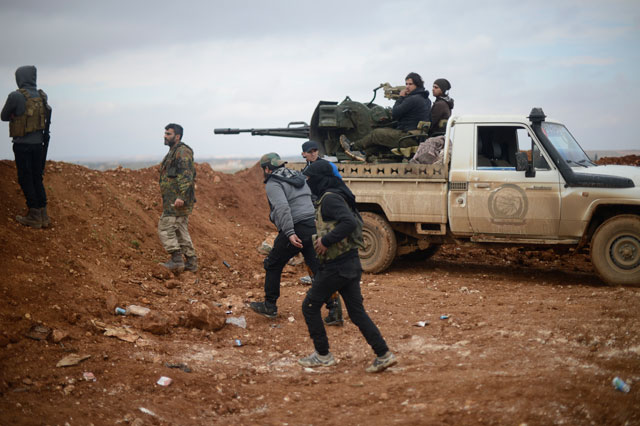 Members of the Free Syrian Army attack Daesh positions at Kabasin town in eastern Aleppo as they advance to Al Bab town of Aleppo during the ‘Operation Euphrates Shield’ in Aleppo, Syria, on Saturday (Anadolu agency photo)
