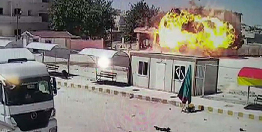 xIn this still image taken from video made available on Thursday, an explosion is captured by a camera on the Turkish side of the border moments after a car bomb detonates in the Kurdish town of Kobani, Syria (Reuter)