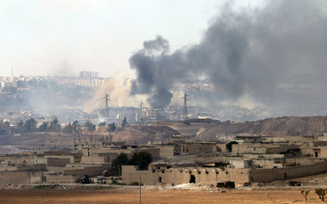 Smoke billows on Sunday from a location on the southern outskirts of the Syrian city of Aleppo after regime forces retook control of three military academies from rebel fighters (AFP photo)