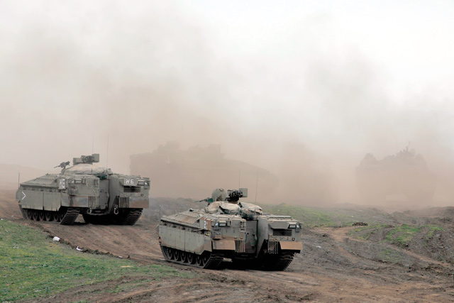 Israeli forces are pictured during a military drill in the Israeli-annexed Golan Heights on Wednesday (AFP photo)