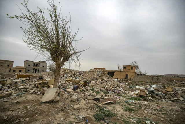 The rubble of destroyed buildings in the eastern Syrian village of Baghouz, pictured in March, one year after the fall of the Daesh so-called caliphate (AFP photo)