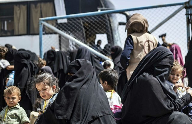 In this undated photo, women of Daesh terrorists and their children in Al Hol camp, Syria (AFP photo)