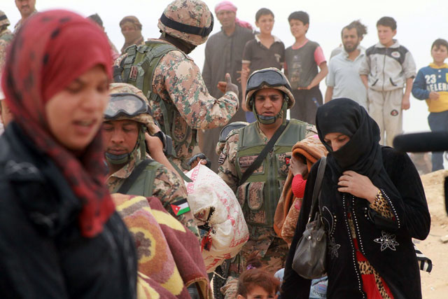 According to the UN, more than 85,000 Syrian refugees are stranded at Rakban settlement in the no-man’s-land between Jordan and Syria (Photo by Osama Aqarbeh)