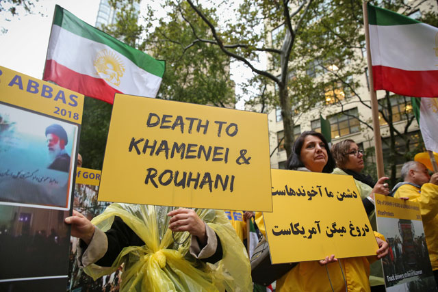 Iranian Americans and opponents of Iranian President Hassan Rouhani hold protest outside of UN headquarters in Manhattan, New York, US, on Tuesday (Reuters photo)