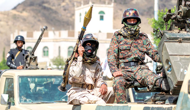 Yemeni soldiers loyal to the Shiite Houthi rebels ride on military vehicles during a parade in the capital Sanaa on Tuesday to show support against the Saudi-led intervention in the country (AFP photo)