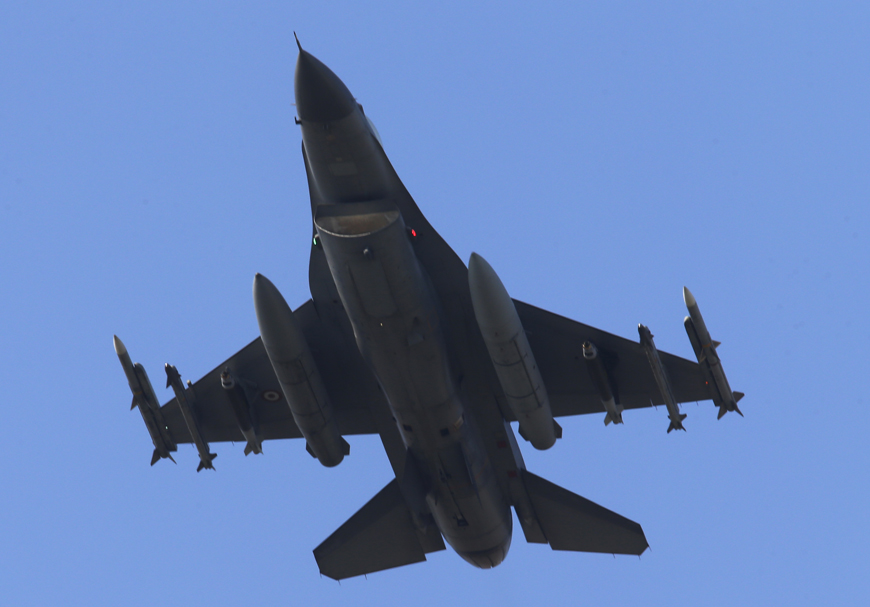 A missile-loaded Turkish Air Force jet after taking off from Incirlik Air Base in Adana, southern Turkey, on Wednesday (AP photo)