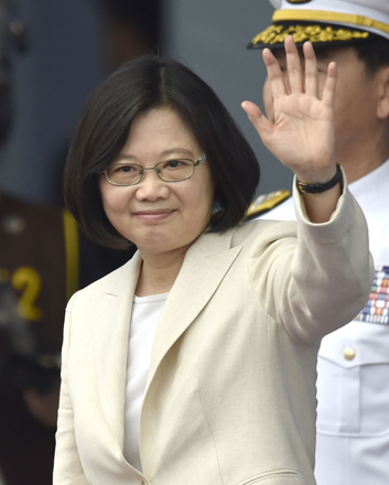 Taiwan's Tsai Ing-wen waves at the venue of her inauguration at the Presidential Office Building in Taipei, Taiwan, on Friday (Minoru Iwasaki/Kyodo News via AP)