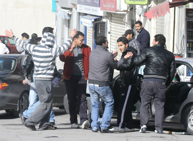 In this file photo, Tawjihi students celebrate success. New regulations under evaluation would allow students who lost all their chances to pass the test to reapply (JT photo)