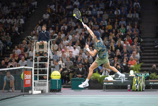Denmark's Holger Rune returns the ball during the men's singles semifinal tennis match between Denmark's Holger Rune and Canada's Felix Auger-Aliassime on day 6 of the ATP World Tour Masters 1000 — Paris Masters (Paris Bercy) — indoor tennis tournament at The AccorHotels Arena in Paris on Saturday (AFP photo)