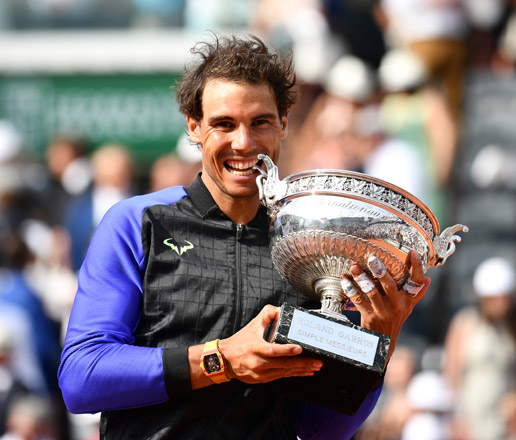 Rafael Nadal of Spain kisses the championship trophy after winning his French Open final match against Stan Wawrinka of Switzerland at the Roland Garros stadium in Paris on Sunday (Anadolu Agency photo)