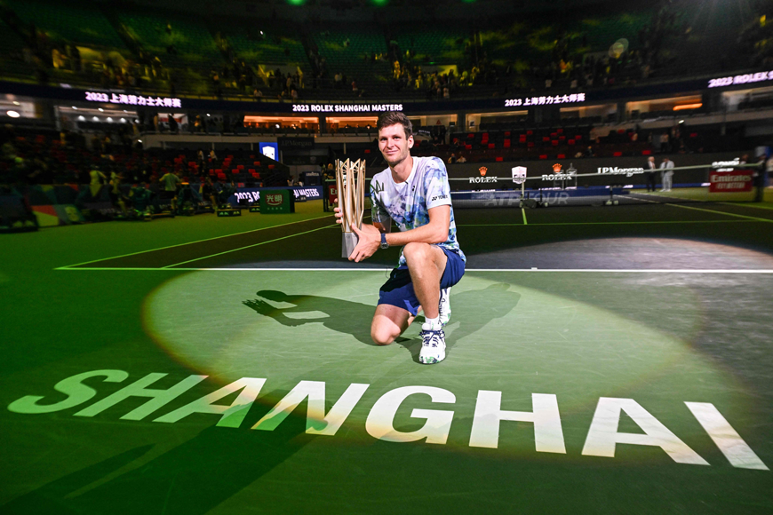 Hubert Hurkacz celebrates with the winner’s trophy after winning against Andrey Rublev in their men’s singles final match at the Shanghai Masters tennis tournament in Shanghai on Sunday (AFP photo)
