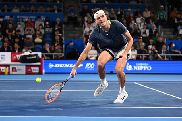USA’s Taylor Fritz hits a return against Japan’s Shintaro Mochizuki during the men’s singles match on day four of the ATP Japan Open tennis tournament in Tokyo on Thursday (AFP photo)