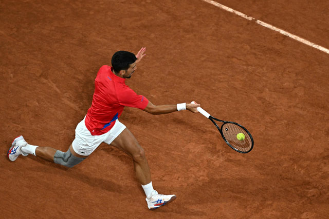 Serbia’s Novak Djokovic returns to Australia’s Matthew Ebden during their men’s singles first round tennis match on Court Philippe-Chatrier at the Roland-Garros Stadium at the Paris 2024 Olympic Games, in Paris on Saturday (AFP photo)
