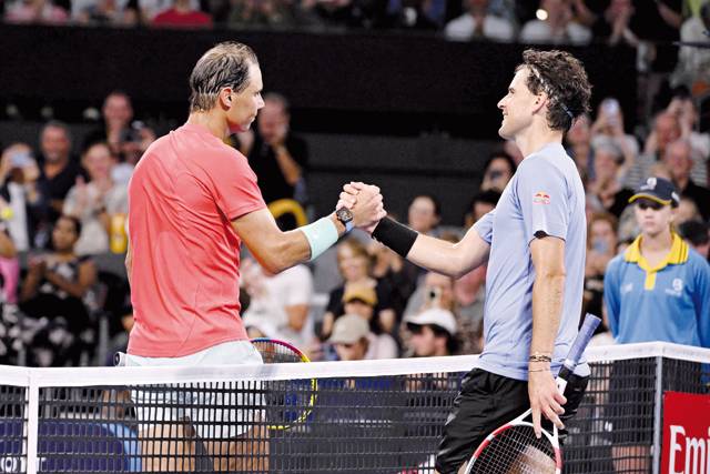 Winner Rafael Nadal of Spain (left) shakes hands with Austria’s Dominic Thiem after their men’s singles match at the Brisbane International tennis tournament in Brisbane on Tuesday (AFP photo)