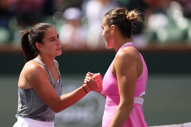 Emma Navarro of the United States shakes hands at the net after her three set victory against Aryna Sabalenka in their fourth round match during the BNP Paribas Open at Indian Wells Tennis Garden on Wednesday in Indian Wells, California (AFP photo)