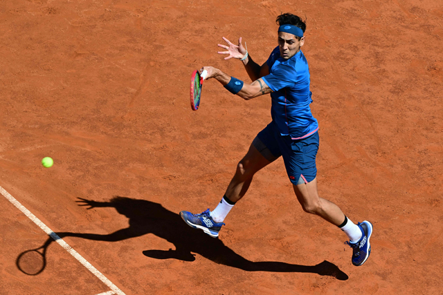 Chile’s Alejandro Tabilo returns to Serbia’s Novak Djokovic during the Men’s ATP Rome Open tennis tournament at Foro Italico in Rome on Sunday (AFP photo)