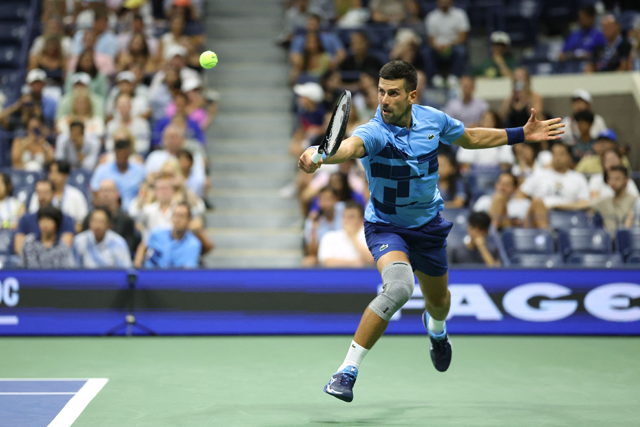 Serbia’s Novak Djokovic returns the ball to Moldova’s Radu Albot during their men’s singles first round tennis match on day one of the US Open tennis tournament at the USTA Billie Jean King National Tennis Center in New York City, on Tuesday (AFP photo)