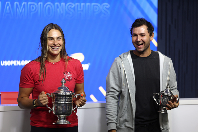 Aryna Sabalenka of Belarus poses for a photo with her coach Anton Dubrov at the press conference after defeating Jessica Pegula of the United States to win the Women’s Singles Final on Day Thirteen of the 2024 US Open at USTA Billie Jean King National Tennis Centre on Sunday (AFP photo)