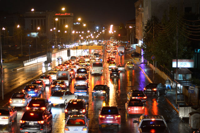 The downpour in Amman on Thursday exacerbated traffic jams on the last day of the week (Photo by Amjad Ghsoun)