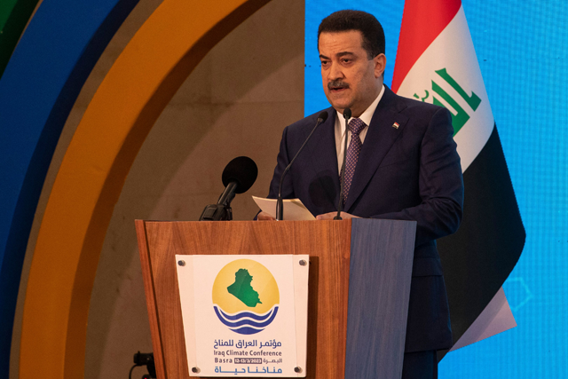 Iraq's Prime Minister Mohammed Shia Al Sudani delivers a speech during the Iraq Climate Conference in Basra on Sunday  (AFP photo)
