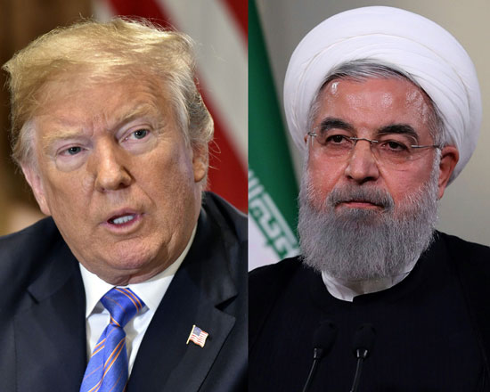 This combination of photos created on Monday shows US President Donald Trump speaking during a Cabinet meeting on July 18 at the White House in Washington, DC, and President Hassan Rouhani giving a speech on Iranian TV in Tehran in a handout photo provided by the Iranian presidency on May 2 (AFP photo)