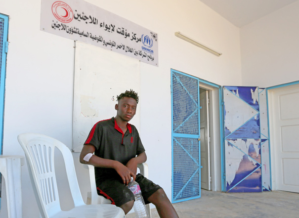 A Malian migrant Souleyman Coulibaly, who was rescued after the boat capsized in the Mediterranean Sea off the Tunisian coast on its way from Libya to Italy, is pictured at the Red Crescent centre in the Tunisian coastal city of Zarzis, on Thursday (AFP photo)