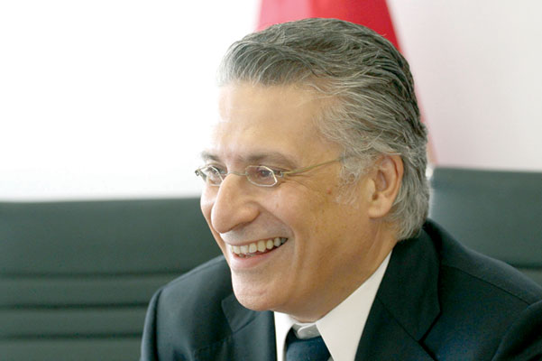 In this file photo taken on August 2, Nabil Karoui, Tunisian media magnate and would-be presidential candidate is pictured after submitting his candidacy to Tunisia's electoral commission in the capital Tunis (AFP photo)