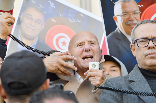 Ahmed Nejib Chebbi, political committee chief of Tunisia's Amal Party and leader of the opposition National Salvation Front takes part in a demonstration in Tunis on Sunday (AFP photo)