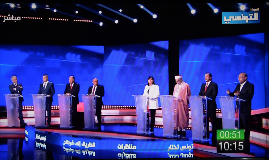 This TV grab taken from Ettounsiya TV shows candidates attending a TV debate for presidential candidates on Sunday in Tunis (AFP photo)