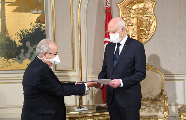 A handout photo provided by the Tunisian Presidency’s official Facebook Page on Monday shows President Kais Saied (right) receiving a letter from Algerian Minister of Foreign Affairs Ramtane Lamamra in the capital Tunis (AFP photo)
