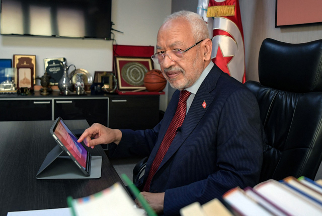 Tunisia’s parliament speaker and Ennahdha Party leader Rached Ghannouchi is photographed at his office during an interview with AFP, in the capital Tunis, on Thursday (AFP photo)
