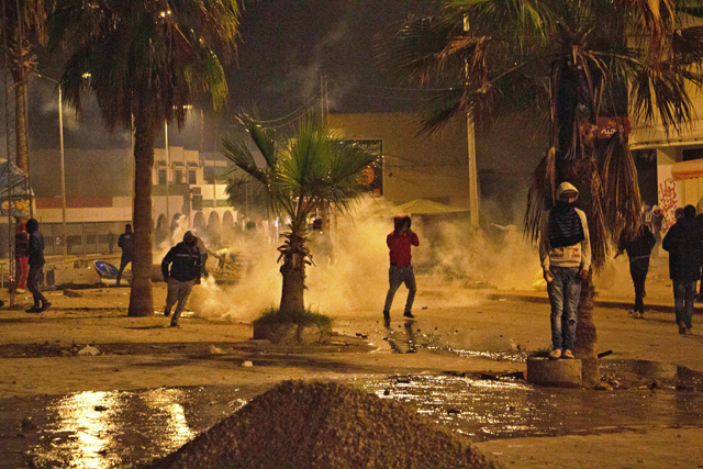 Youth clash with security forces in the central region of Sfax, which has seen weeks of angry demonstrations over a growing waste crisis on Tuesday (AFP photo)