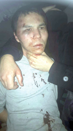 Suspected Reina club attacker after being caught by Turkish police in Istanbul, late Monday (AP photo)