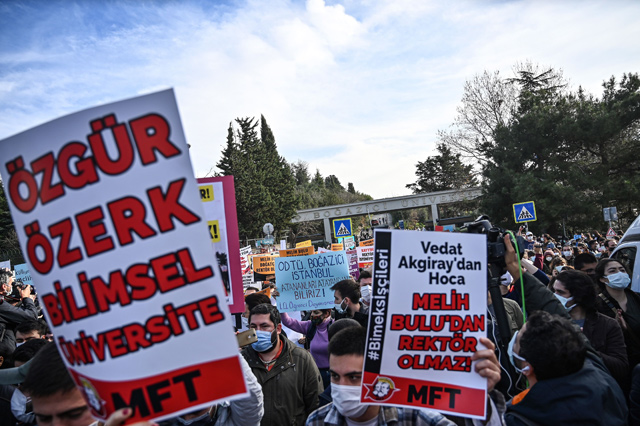 Students hold placards reading ‘We do not want the appointed Rector’ as they demonstrate against the direct appointment Bogazici university’s new rector by Turkish president, on Monday, in front of the University in Istanbul (AFP photo)
