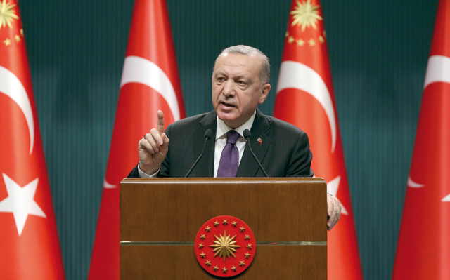 Turkish President Recep Tayyip Erdogan makes a speech as he holds a press conference following the Cabinet meeting at the presidential complex in Ankara, on Monday (AFP photo)