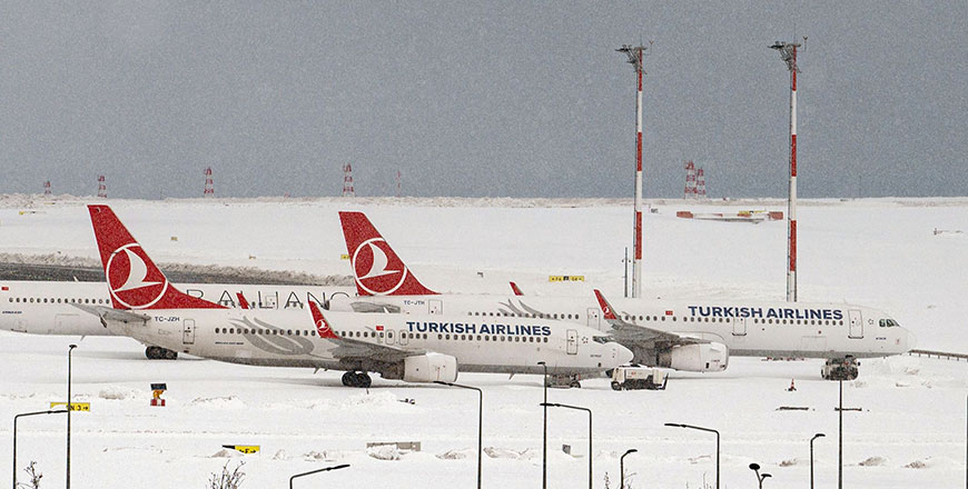 Aircrafts are parked on the tarmac of Istanbul airport, where flights are cancelled due to blizzard and heavy snowfall, in Istanbul, Turkey, on Tuesday (AFP photo)