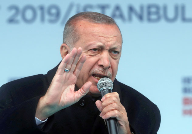 Turkish President Recep Tayyip Erdogan addresses his supporters during a rally for the upcoming local elections in Istanbul, Turkey, on Tuesday (Reuters photo)