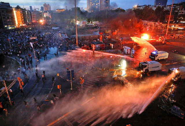 Turkish police use water cannons to disperse protesters at Taksim Square in Istanbul, Turkey, on June 11, 2013 (Reuters photo)