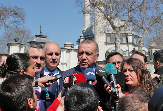Turkish President Recep Tayyip Erdogan talks to media in Istanbul, Turkey, on Friday (Reuters photo)