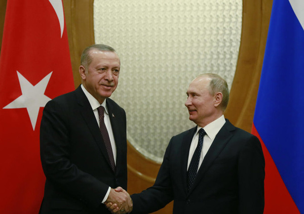 Russian President Vladimir Putin( right) earlier hosted Turkish President Recep Tayyip Erdogan in Moscow, on February 14 (AFP photo)