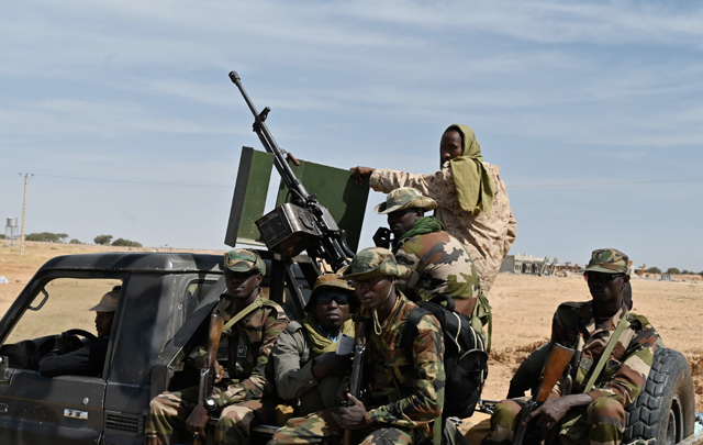 Nigerien soldiers patrol outside the Diffa airport in southeast Niger, where extremists violence has spread from neighbouring Nigeria (AFP photo)