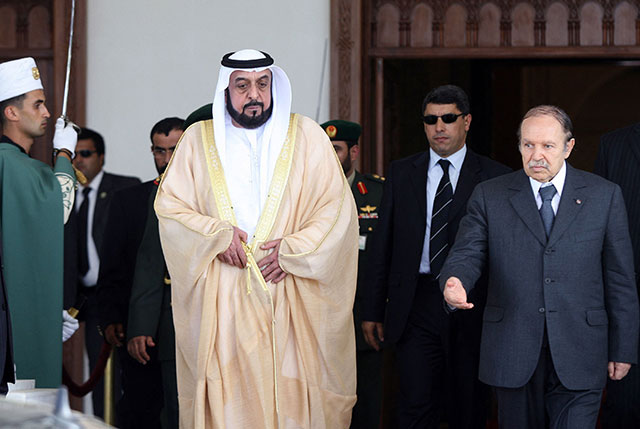 In this file photo taken on July 16, 2007 Algeria's president Abdelaziz Bouteflika (right) escorts his United Arab Emirates counterpart Sheikh Khalifa Bin Zayed Al Nahyan during their meeting at Algiers airport (AFP photo)