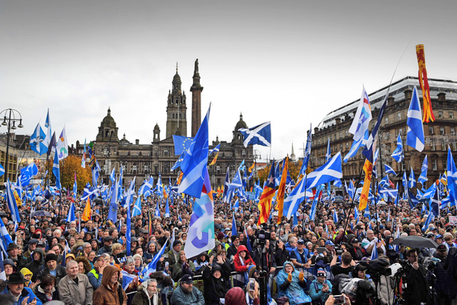 Pro- Scottish Independence campaigners listen as Scottish Nationalist Party (SNP) leader Nicola Sturgeon, Scotland's First Minister addresses a rally calling for Scottish independence in Glasgow on Saturday (AFP photo)