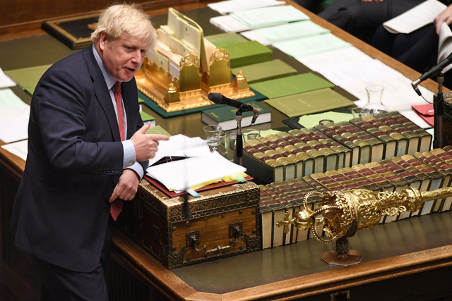 This handout photo released by the UK Parliament shows Britain's Prime Minister Boris Johnson appearing in the House of Commons in central London on Wednesday, during the Prime Minister's Questions session (AFP photo)