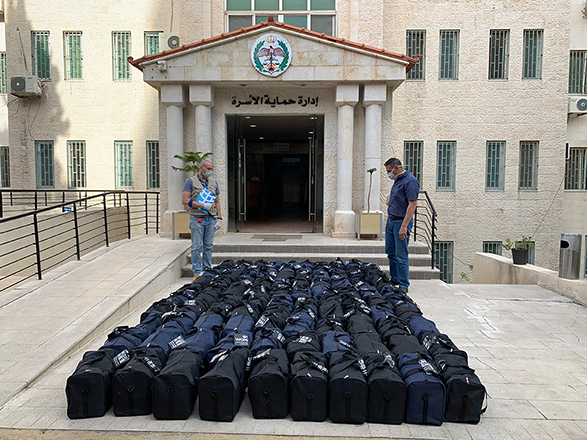 UN Women, in partnership with the Public Security Directorate, provide the Family Protection Department with recovery bags to be distributed to gender-based violence survivors, including clothes and hygienic supplies, to address their immediate needs in safe centres or shelters  (Photo courtesy of UN Women/Khaleel Abdulkareem)