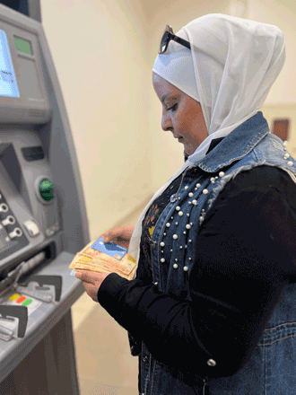Um Tuqa is one of more than 120,000 refugees across host communities in Jordan who receive cash assistance through UNHCR thanks to the continued support of the European Union and other donors (Photo courtesy of UNHCR)