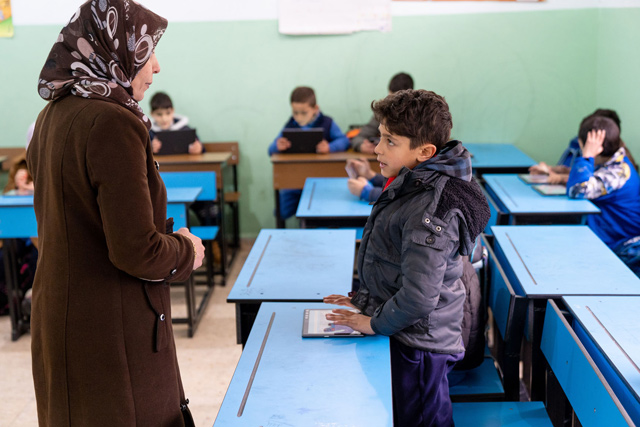 UNICEF’s ‘Let’s Live in Harmony’ multimedia literacy project was designed to improve reading capabilities of refugee and Jordanian children (Photo courtesy of UNICEF Jordan)