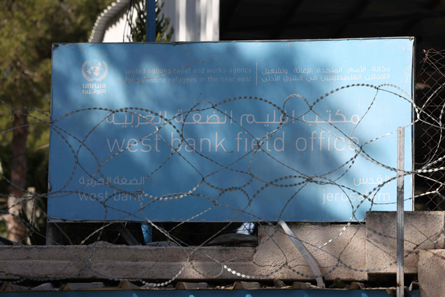 Barbed-wire covers the walls surrounding the UNRWA (United Nations Relief and Works Agency) West Bank Field Office in Jerusalem on October 29, 2024. Israel's UN ambassador says the UNRWA must leave Jerusalem by January 30, 2025, in a letter to the UN on January 24, 2025 (AFP photo)
